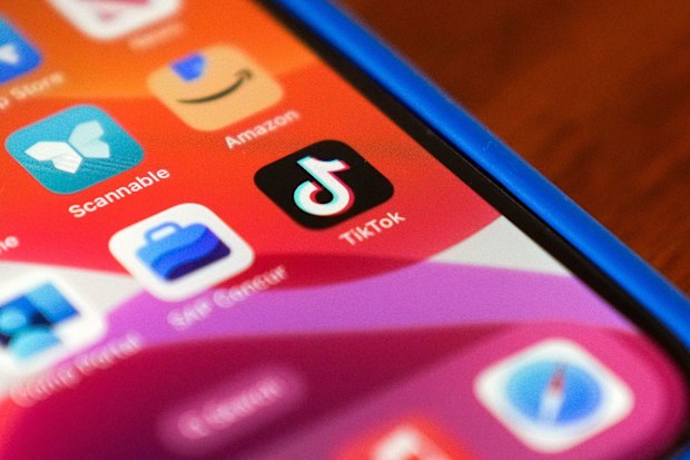 The TikTok app logo is shown on an iPhone on January 17 in Houston. Google Play said it restored TikTok to the US app store on February 13.
