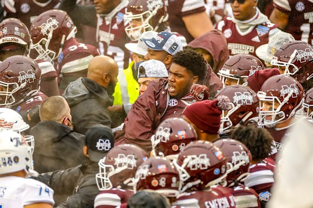 A fight breaks out after the Armed Forces Bowl game.