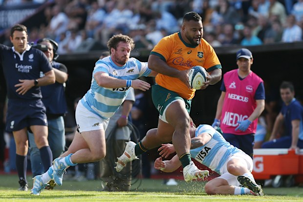 Taniela Tupou of Australia is tackled by Julian Montoya of Argentina.