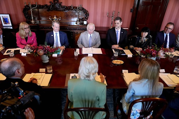 King Charles III and Australian Governor-General Sam Mostyn sit opposite each other during a Sustainable Markets Initiative discussion at Admiralty House on October 22, 2024 in Sydney