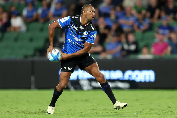 Kurtley Beale of the Force passes the ball.