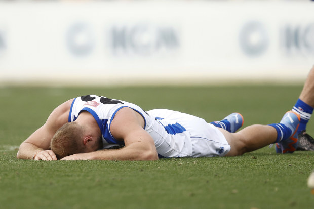 MELBOURNE, AUSTRALIA - MARCH 04: Ben McKay of the Kangaroos reacts after Aaron Naughton of the Bulldogs attempted to mark the ball against him during the AFL Practice Match between the Western Bulldogs and the North Melbourne Kangaroos at Ikon Park on March 04, 2023 in Melbourne, Australia. (Photo by Daniel Pockett/AFL Photos/via Getty Images )