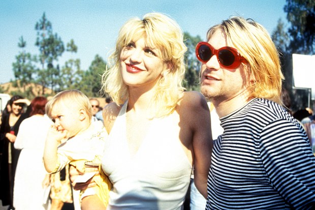 Kurt Cobain with wife Courtney Love and daughter Frances Bean