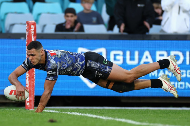 Jacob Kiraz of the Bulldogs scores a try during the round 12 NRL match between Canterbury Bulldogs and Gold Coast Titans at Accor Stadium on May 21, 2023 in Sydney, Australia. (Photo by Cameron Spencer/Getty Images)