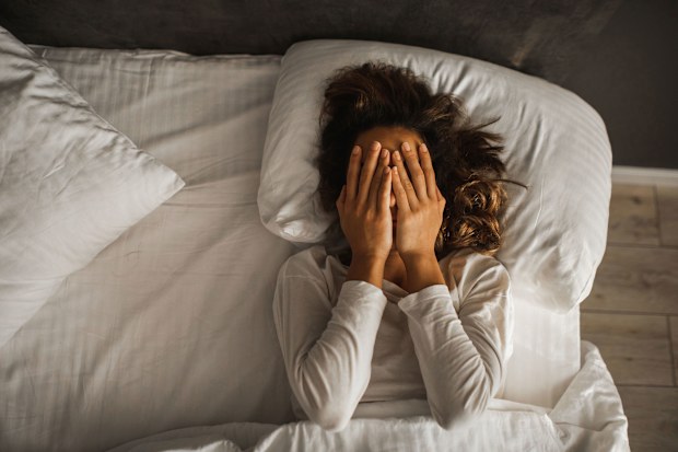 A woman suffering from sleep deprivation.