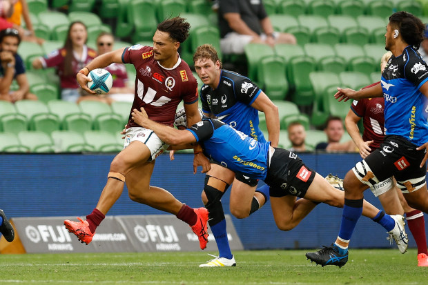 Jordan Petaia is tackled by a Western Force player.