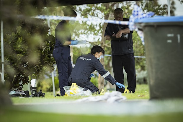 Forensic police investigate at the scene in Werribee South where the dispute took place.