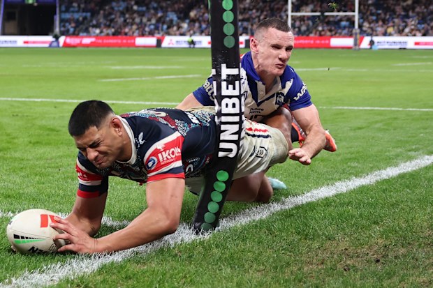 Daniel Tupou of the Roosters scores a try.