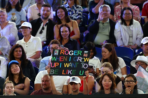MELBOURNE, AUSTRALIA - JANUARY 17: Spectators in the crowd show their support during the Opening Ceremony ahead of the 2026 Australian Open at Melbourne Park on January 17, 2026 in Melbourne, Australia. (Photo by Graham Denholm/Getty Images)