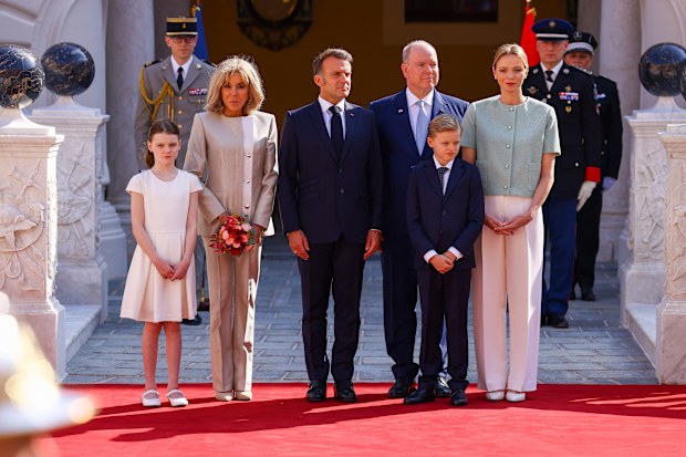 French President Emmanuel Macron (3rd L) and his wife Brigitte Macron (2nd L) stand with Prince Albert II of Monaco (2nd R), Princess Charlene (R) and their children Gabriella (L) and Jacques (3rd R) during a welcoming ceremony upon their arrival for a two-day state visit at the Prince's Palace in Monaco ahead of the Unoc3 on June 7, 2025 in Monaco, Monaco