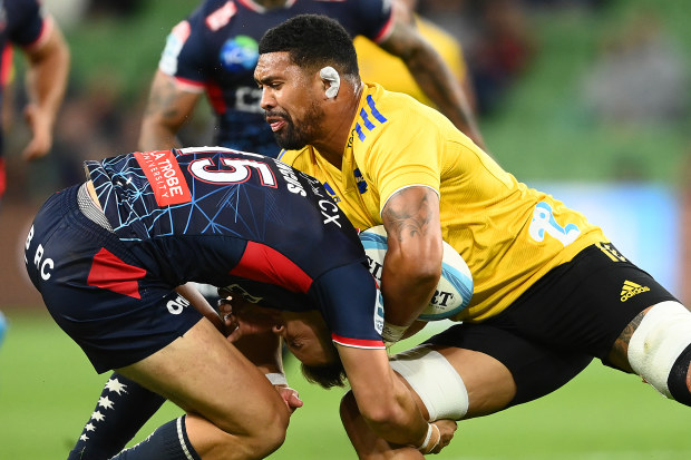 Hurricanes captain Ardie Savea is tackles in round two Super Rugby Pacific.