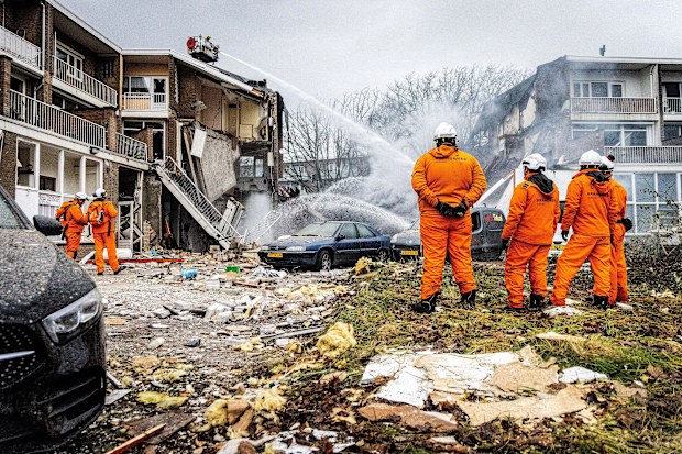 A recovery mission is under way after an explosion rocked an apartment block in the Hague
