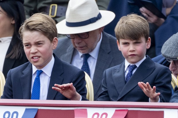 Prince George of Wales and Prince Louis of Wales during the military procession to mark the 80th anniversary of VE Day on May 5, 2025 in London, England. 