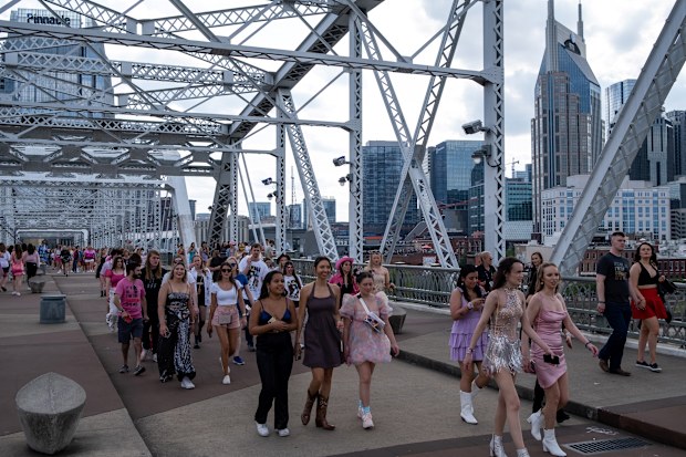 Taylor Swift fans going to the Eras tour.