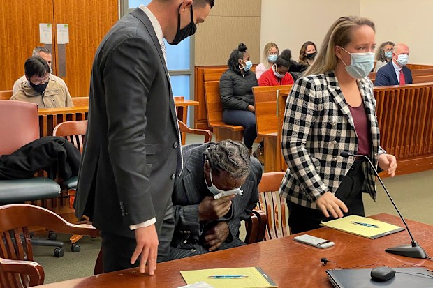 Anthony Broadwater breaks down crying on Monday, November 22, 2021, in Syracuse, N.Y., when a judge overturned his 40-year-old rape conviction. 