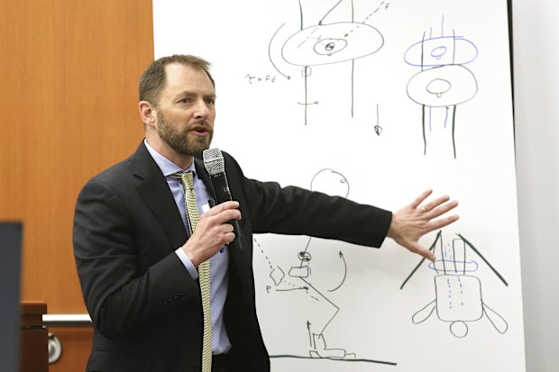 Dr. Irving Scher shows an accident simulation during testimony in Gwyneth Paltrow's trial, Tuesday, March 28, 2023, in Park City, Utah
