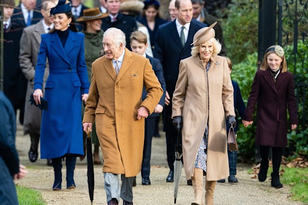 King Charles III, Queen Camilla, Catherine, Princess of Wales,  Prince George of Wales, Prince William, Prince of Wales andMia Tindall attend the Christmas Morning Service at Sandringham Church on December 25, 2023 in Sandringham, Norfolk.