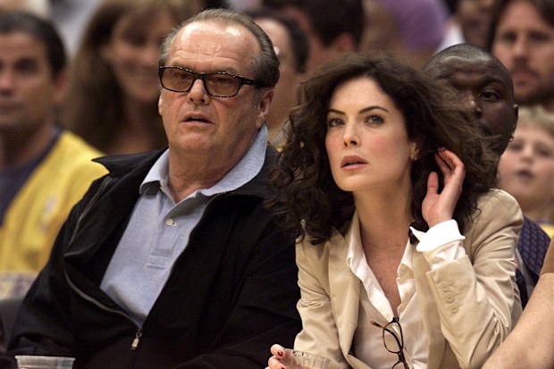 Actors Jack Nicholson and Lara Flynn Boyle watch Game 3 of the NBA Western Conference Finals between the San Antonio Spurs and the Los Angeles Lakers, courtside at the Staples Center, Los Angeles, California, May 25, 2001. (Photo by Getty Images)
