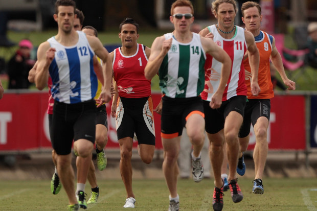 John Steffensen (1) racing the 550m at the 2014 Stawell Gift.