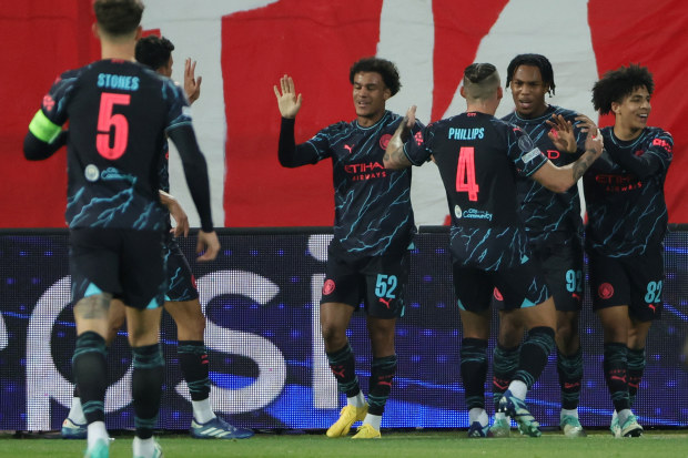 BELGRADE, SERBIA - DECEMBER 13: Micah Hamilton of Manchester City celebrates with teammates after scoring their team's first goal during the UEFA Champions League match between FK Crvena zvezda and Manchester City at Stadion Rajko Miti on December 13, 2023 in Belgrade, Serbia. (Photo by Srdjan Stevanovic/Getty Images)