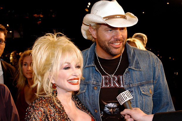 Dolly Parton and Toby Keith during 2003 BMI Country Music Awards.