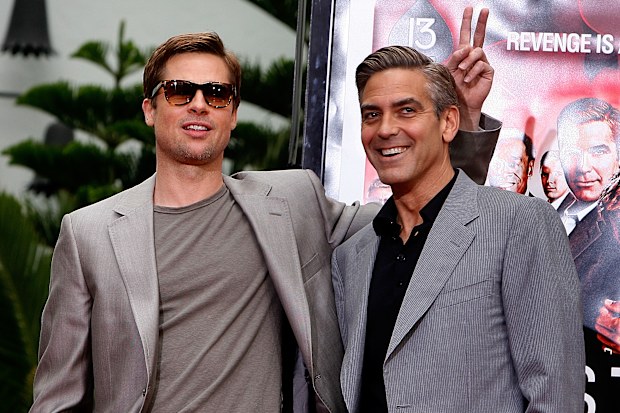 Brad Pitt and George Clooney during the Hand and Footprints Ceremony at Grauman's Chinese Theatre on June 5, 2007 in Hollywood, California.