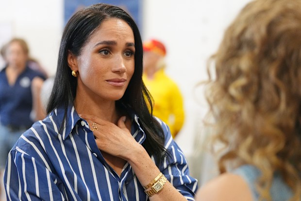 Meghan Markle, the Duchess of Sussex, meets volunteer first responders from the Bondi Surf Bathers' Life Saving Club during a visit to Bondi Beach, Australia, Friday, April 17, 2026. 