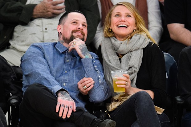 Benji Madden  and Cameron Diaz attend a basketball game between the Washington Wizards and the Los Angeles Lakers at Staples Center on January 27, 2015 in Los Angeles, California.