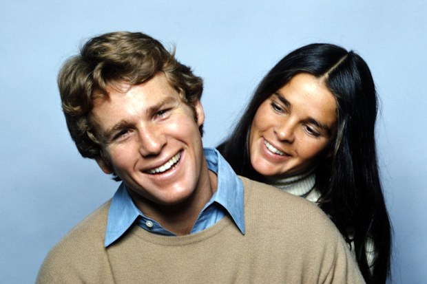 Ryan O'Neal and Ali MacGraw in a promotional still for Love Story, directed by Arthur Hiller, 1970. 