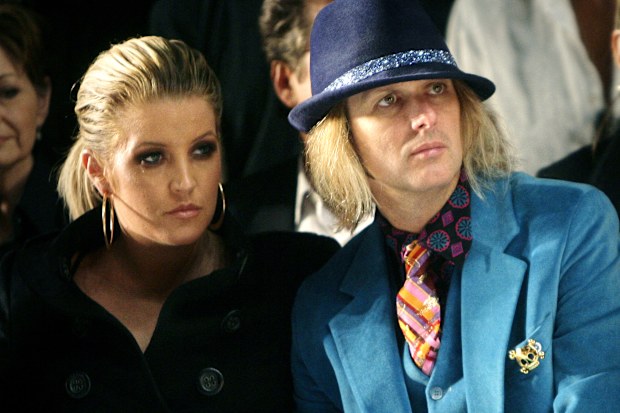 Lisa Marie Presley and her husband, Michael Lockwood, watch the Anna Sui 2008 spring/summer show at Fashion Week in New York, Sept. 10, 2007