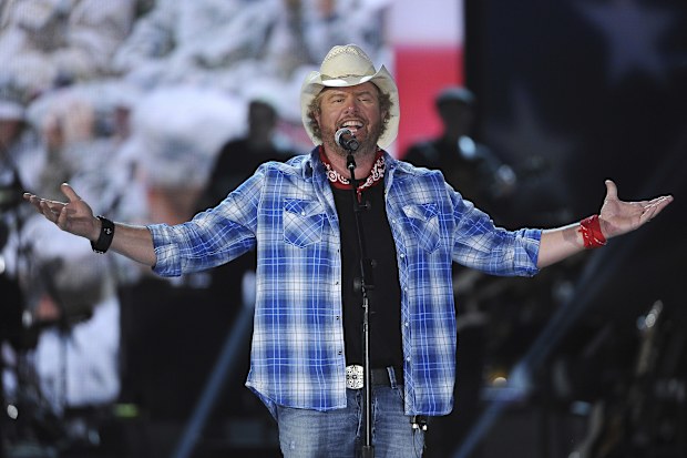 In this April 7, 2014, file photo shows Toby Keith performs at ACM Presents an All-Star Salute to the Troops in Las Vegas.