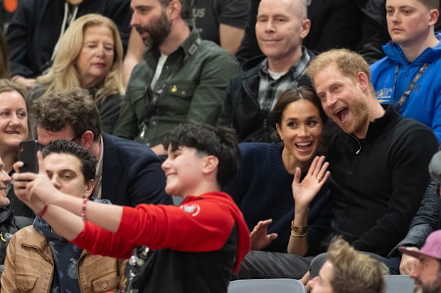 Prince Harry, Duke of Sussex and Meghan, Duchess of Sussex pose for a photo as they attend the Wheelchair Basketball final between USA and Israel during day one of the 2025 Invictus Games on February 9, 2025 in Vancouver, Canada