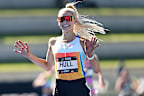 SYDNEY, AUSTRALIA - APRIL 12: Jessica Hull celebrates winning the Women's 5000m final during the 2026 Australian Athletics Championships at Sydney Olympic Park Athletic Centre on April 12, 2026 in Sydney, Australia. (Photo by Cameron Spencer/Getty Images)
