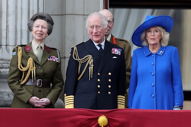 Princess Anne, Princess Royal, King Charles III and Queen Camilla on the balcony of Buckingham Palace during a fly-past to mark the 80th anniversary of VE Day on May 05, 2025 in London, England. 