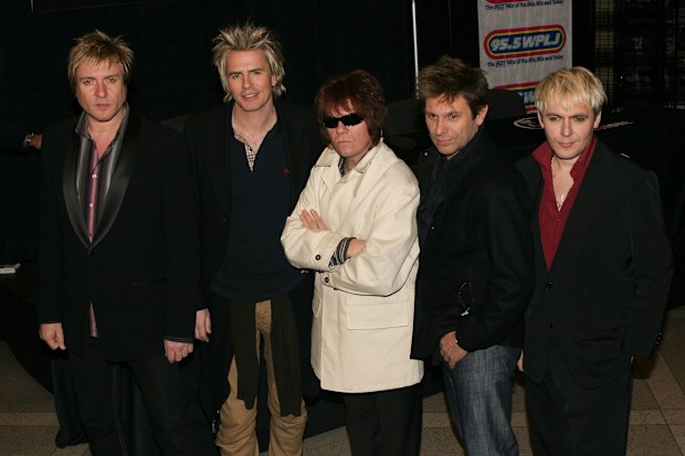 Simon Le Bon, John Taylor, Andy Taylor, Roger Taylor and Nick Rhodes of music group Duran Duran make an appearance at Virgin Records to sign copies of their new CD "Astronaut" October 12, 2004 in New York City. 
