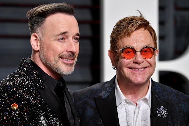 David Furnish and Elton John attend the 2017 Vanity Fair Oscar Party hosted by Graydon Carter at Wallis Annenberg Center for the Performing Arts on February 26, 2017 in Beverly Hills, California.
