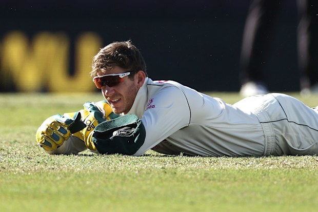 Tim Paine of Australia reacts after dropping a catch off Hanuma Vihari of India.