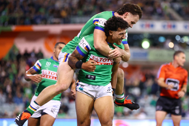 Xavier Savage celebrates scoring a try with teammates during the round five NRL match between the Canberra Raiders and the Parramatta Eels.