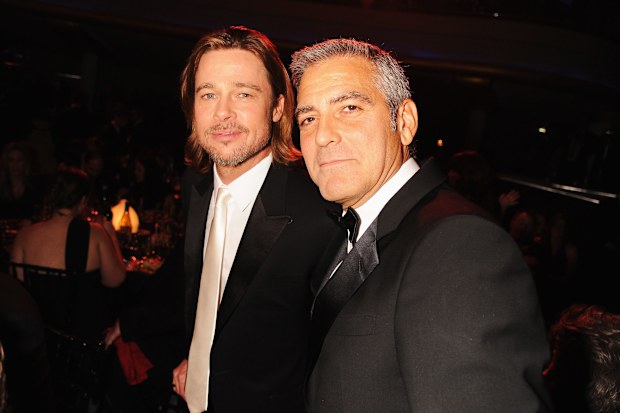 Brad Pitt and George Clooney attend the Critics' Choice Movie Awards in 2012.