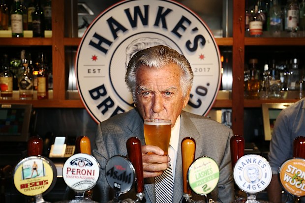Bob Hawke drinks his own beer at the launch of Hawke's Lager in 2017.