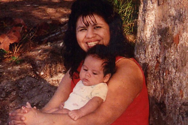 Texas death row inmate Melissa Lucio is holding one of her sons, John. 