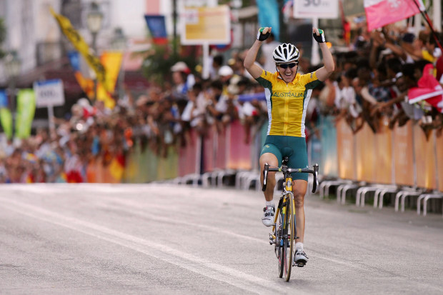 Australian cyclist Sara Carrigan celebrates winning Olympic gold at the Athens 2004 Games.