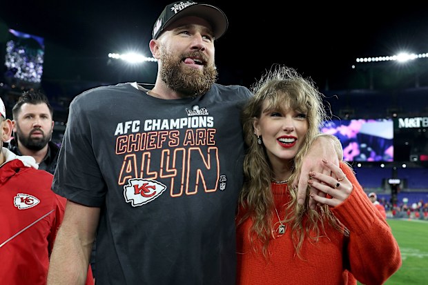 Travis Kelce thanks Taylor Swift 'for joining the team,' and the two are seen here on Jan. 28.