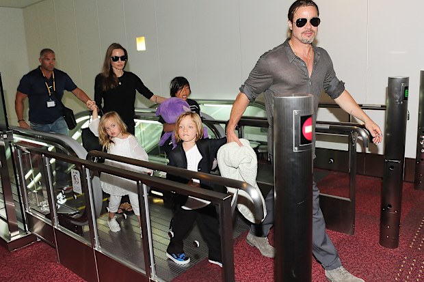 Brad Pitt, Angelina Jolie and their six children Maddox, Pax, Zahara, Shiloh, Knox, and Vivienne, 2013
