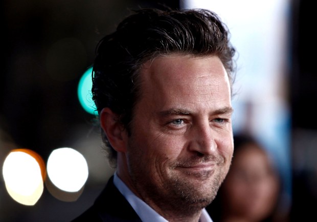 Matthew Perry, seen here arriving to a movie premiere in 2009, died Saturday.