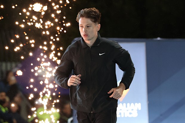 MELBOURNE, AUSTRALIA - MARCH 28: Lachlan Kennedy is introduced ahead of the Men's 200m during the 2026 Maurie Plant Meet at Lakeside Stadium on March 28, 2026 in Melbourne, Australia. (Photo by Kelly Defina/Getty Images)