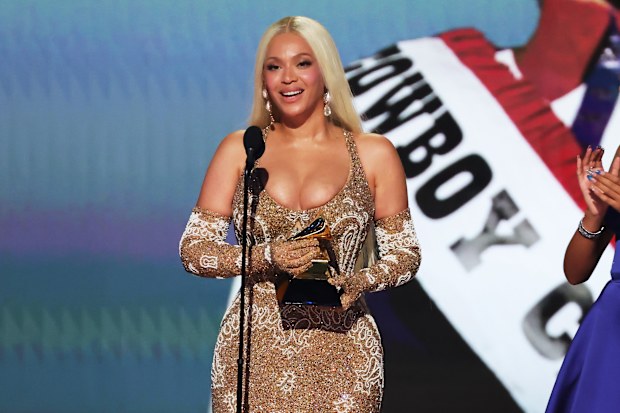 Beyoncé accepts the Album of the Year award for COWBOY CARTER with Blue Ivy Carter onstage during the 67th Annual GRAMMY Awards at Crypto.com Arena on February 2, 2025 in Los Angeles, California. 