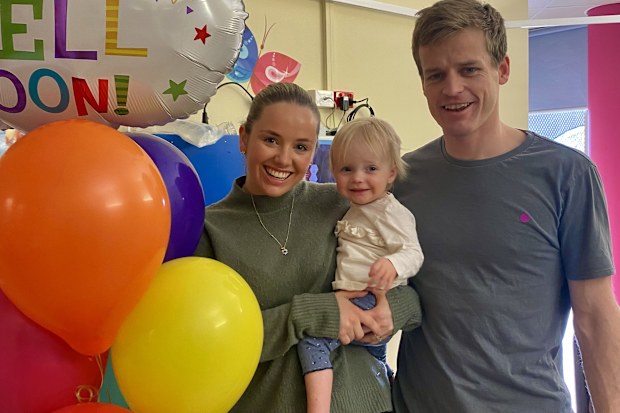 Sophia with her parents in hospital at the start of her cancer journey.
