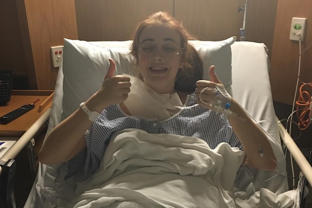Kodi Brown in hospital after having her thyroid removed.