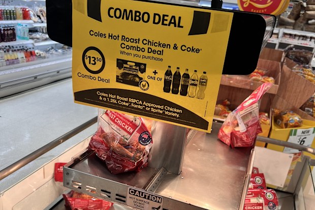 coles roast chickens display